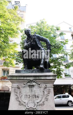 Paris, France - August 26, 2019: Statue of Denis Diderot by artist Jean Gautherin installed on 1886 at Boulevard Saint-Germain Stock Photo