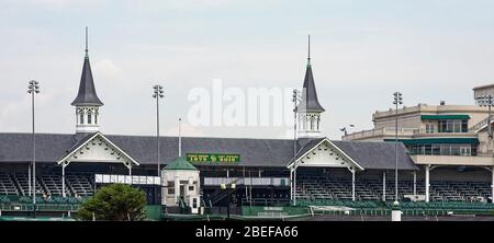 Churchill Downs Racetrack; iconic twin spires; grandstand; clubhouse; tall light stands; home of Kentucky Derby; famous hore racing venue; Louisville; Stock Photo