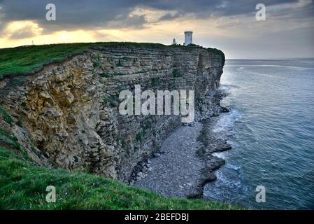 Nash Point and Lighthouse at sunrise, South Wales (1) Stock Photo