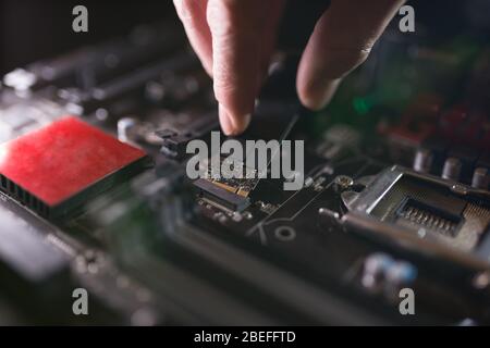 Hard disk SSD m2 on the motherboard background. Stock Photo by ©believeinme  222494838