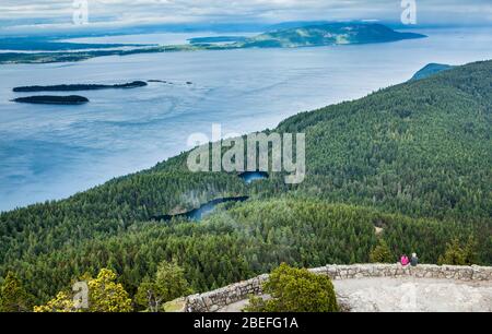 A view from atop the tower on the summit of Mount Constitution looking down at Twin Lakes on Orcas Island, Washington, part of the San Juan Islands ar Stock Photo