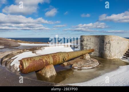 Gun used to protect shipping from German U-Boats during World War II, viewed at Cape Spear Lighthouse National Historic Site near St. John's, Newfound Stock Photo