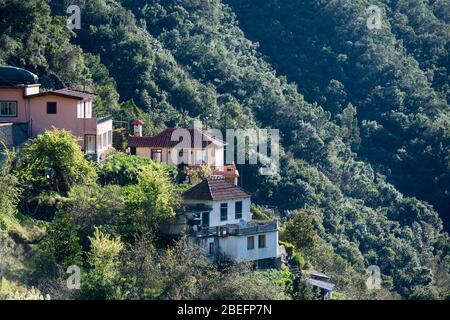 a house at the village of Sao Roque do Faial on the coast at east Madeira on the Island Madeira of Portugal.   Portugal, Madeira, April 2018 Stock Photo