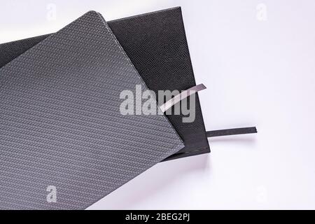 Classic grey and black planners on white background Stock Photo