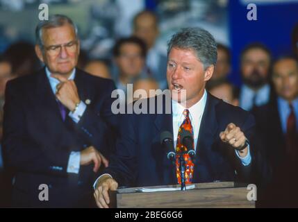 WASHINGTON, DC, USA, OCTOBER 20, 1993: President Bill Clinton speaks during NAFTA Day at White House. Lee Iacoca at left. Stock Photo