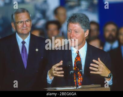 WASHINGTON, DC, USA, OCTOBER 20, 1993: President Bill Clinton speaks during NAFTA Day at White House. Lee Iacoca at left. Stock Photo