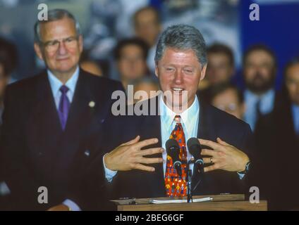 WASHINGTON, DC, USA, OCTOBER 20, 1993: President Bill Clinton speaks during NAFTA Day at White House. Lee Iacoca at left. Stock Photo