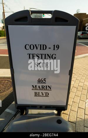 Jersey City, NJ - April 13 2020: a Covid -19 testing center site sign in the city to handle coronavirus testing  Stock Photo