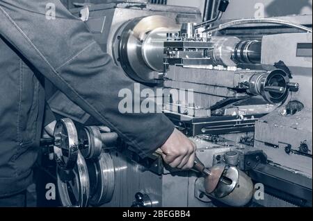 the old Metalworking machine, made in the middle of the last century, is still in good condition. The use of old technology in a time of crisis and st Stock Photo