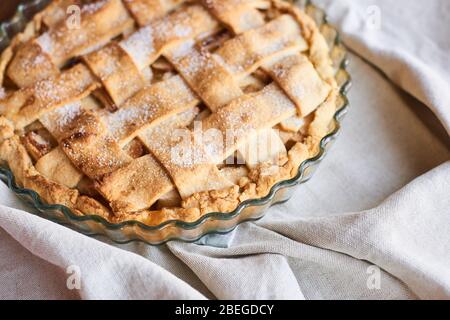 american apple pie and ingredients on wooden background. Top view. Stock Photo