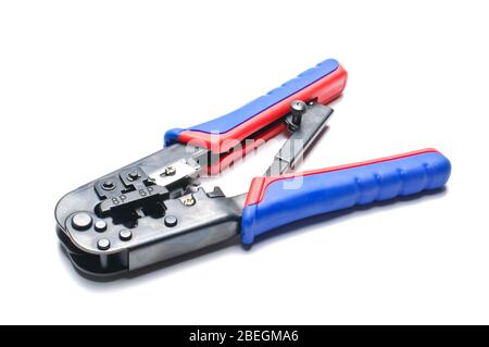 Network cable crimping tool isolated on the white background Stock Photo