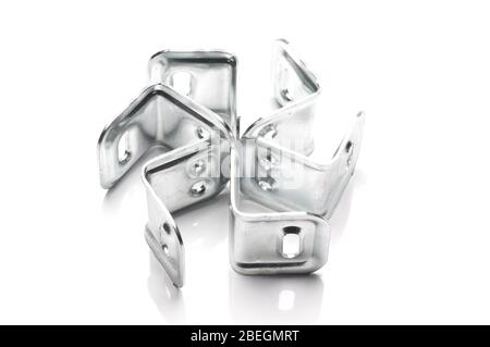 Metal corner flanges for do it yourself projects isolated on the white background Stock Photo