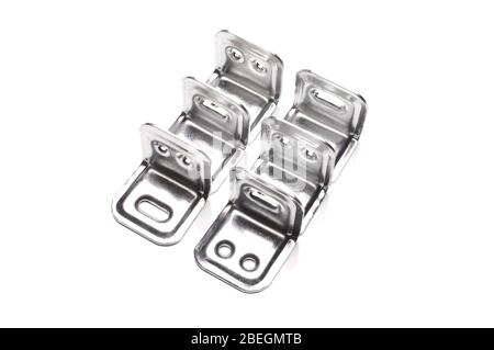 Metal corner flanges for do it yourself projects isolated on the white background Stock Photo