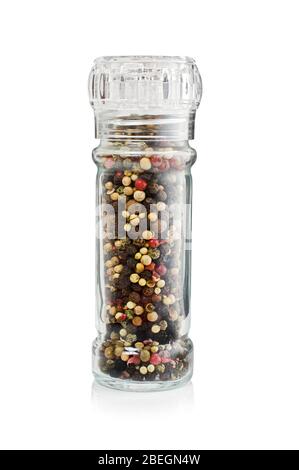 Professional plastic pepper grinder with peppers isolated on the white background Stock Photo