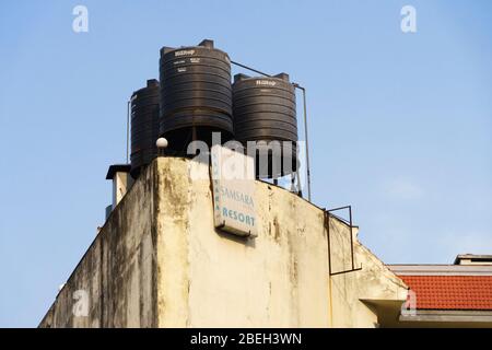 2000 liter Hilltop water tanks on the roof of an hotel in Kathmandu, Nepal. Stock Photo