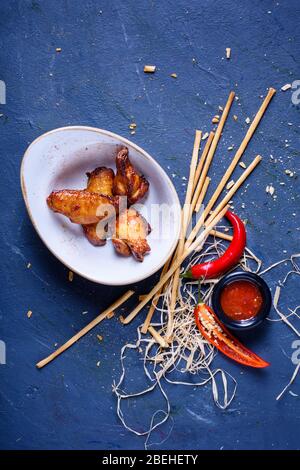 BBQ chicken wings,  spicy snack, top view, copy space. Stock Photo