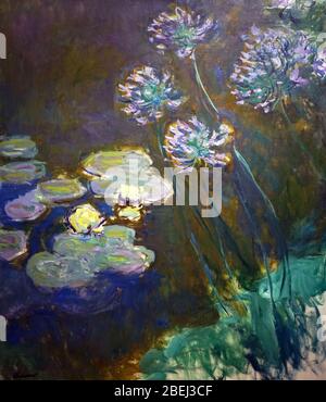 Water Lilies and Agapanthus (1914-1917) by Claude Monet.(1840-1926) Oscar-Claude Monet Stock Photo