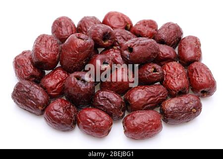 dried jujube fruits, chinese herbal medicine on white background Stock Photo