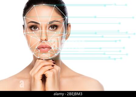 Biometric authentication concept. Facial recognition system of beautiful woman on white background Stock Photo