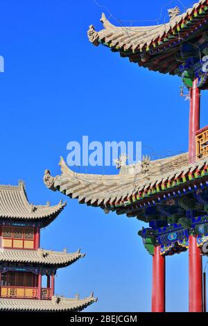 Upturned eaves with chiwen and chishou ornate-Xieshan style roof-Jiayuguan fortress-Gansu-China-0787
