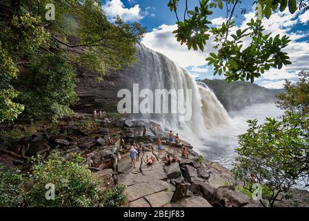 tourists in front of El Sapo Waterfalls, Canaima NATIONAL PARK, Venezuela, South America, America Stock Photo