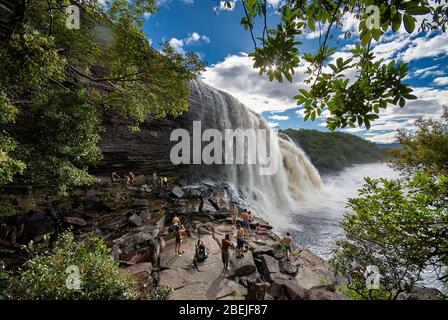 tourists in front of El Sapo Waterfalls, Canaima NATIONAL PARK, Venezuela, South America, America Stock Photo
