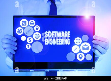 Writing note showing Software Engineering. Business concept for apply engineering to the development of software Stock Photo