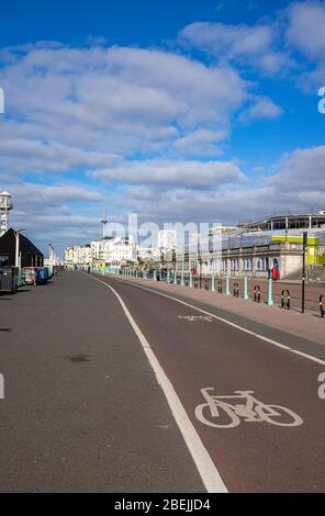 Brighton UK 14th April 2020 - Brighton seafront is quiet on a bright sunny morning as lockdown continues in the UK  through the Coronavirus COVID-19 pandemic crisis  . Credit: Simon Dack / Alamy Live News Stock Photo
