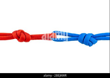Two red and blue cords are connected . Knot on a cord isolated on a white background . Stock Photo