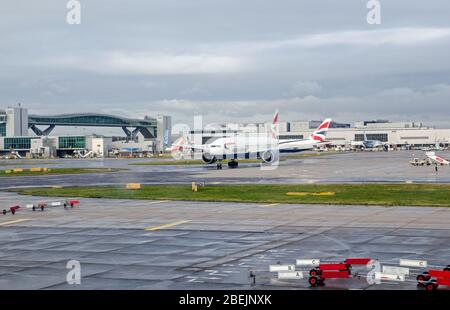 Gatwick, UK - January 3, 2020: British Airways planes preparing to fly from Gatwick Airport on a sunny new year morning in Sussex. Stock Photo