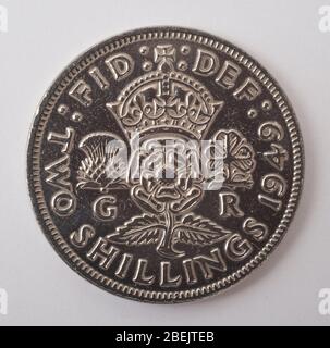 An English two shilling coin dated 1949 photographed against a white background Stock Photo