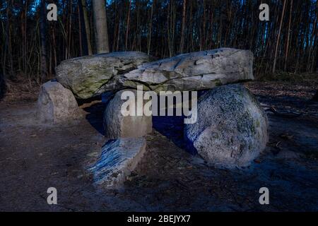 Prehistoric megalith dolmen Teufelskueche (devils kitchen) near Haldensleben in moonlight at night Stock Photo