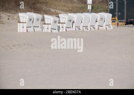 Ahlbeck, Germany. 12th Apr, 2020. The beach chairs at the deserted beach of the Baltic resort Ahlbeck are closed. To slow down the spread of the coronavirus, exit restrictions are currently in place. Credit: Stefan Sauer/dpa-Zentralbild/dpa/Alamy Live News Stock Photo