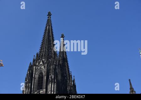 10 April 2020, North Rhine-Westphalia, Cologne: The towers of Cologne Cathedral south side seen from Roncalliplatz Photo: Horst Galuschka/dpa/Horst Galuschka dpa Stock Photo
