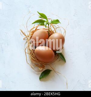 Healthy food concept. Three chicken eggs isolated on white background. Top view. Stock Photo