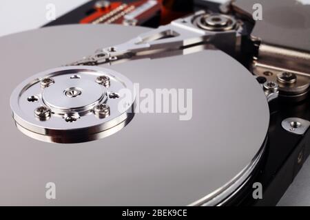 Disassembled computer hard drive with mirror disks Stock Photo