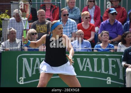 A women’s tennis sports shot of the Latvian female tennis player Jelena Ostapenko playing in a match at Eastbourne, Devonshire Park in 2019 Stock Photo