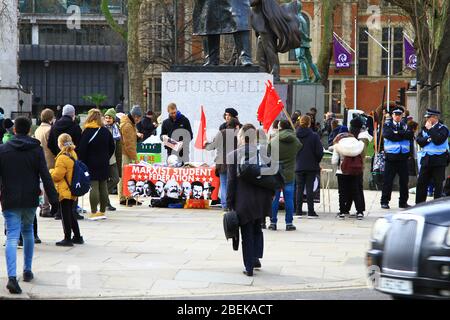 MARXIST STUDENT FEDERATION. BANNER ADVERTISING MARXIST STUDENT FEDERATION STAND BY CHURCHILL STATUE IN PARLIAMENT SQUARE, WESTMINSTER, LONDON, ENGLAND UNITED KINGDOM. MARXISM. Stock Photo