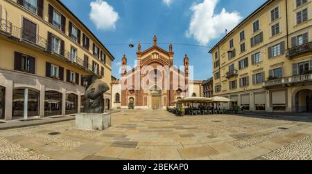 MILAN, ITALY - AUGUST 01, 2019: Santa Maria del Carmine Church. Tourists and locals walk in the center of Milano. Shops, boutiques, cafes and restaura Stock Photo