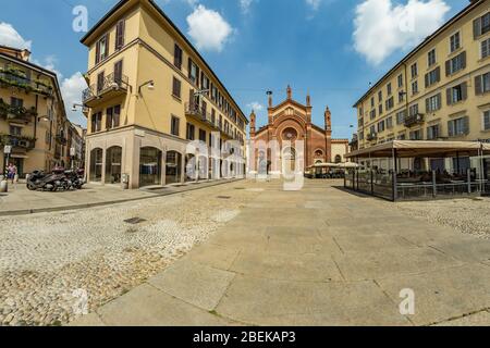 MILAN, ITALY - AUGUST 01, 2019: Santa Maria del Carmine Church. Tourists and locals walk in the center of Milano. Shops, boutiques, cafes and restaura Stock Photo