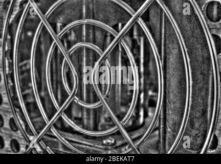 Rear panel of a high frequency power amplifier with vacuum tubes in black and white Stock Photo