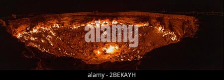Night time panoramic photos of the Darvasa Crater, also known as the Doorway to Hell, the flaming gas crater in Darvaza (Darvasa), Turkmenistan Stock Photo