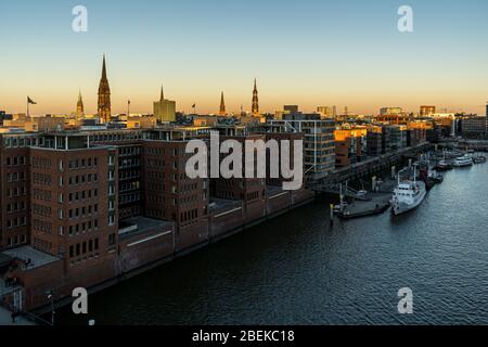 Panoramic view of the Port of Hamburg in the Hafen City at Elbe river at sunset/twilight from the observation deck of the Elbphilharmonie