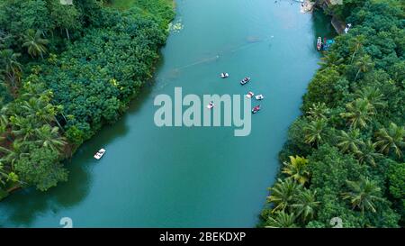 fisherman boat and Vintage wooden boat in sea. Boat drone photo..Aerial view of tropical island beach holiday yacht on blue reef ocean Stock Photo