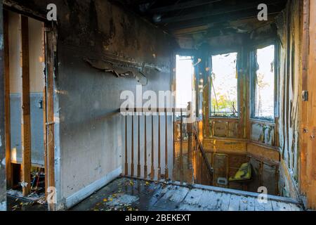 Burned house interior after fire room inside of damaged apartment after burned Stock Photo