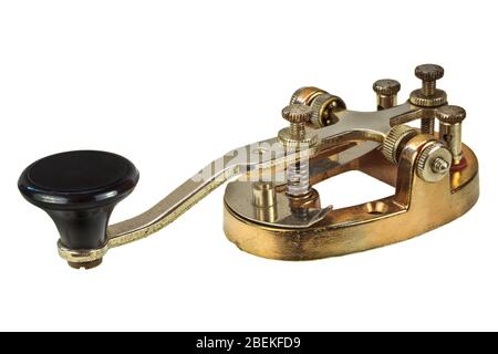 Ancient morse code telegraphy device isolated on a white background Stock Photo