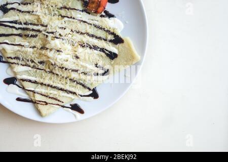 Crepe with chicken, tomatoes and salad Stock Photo