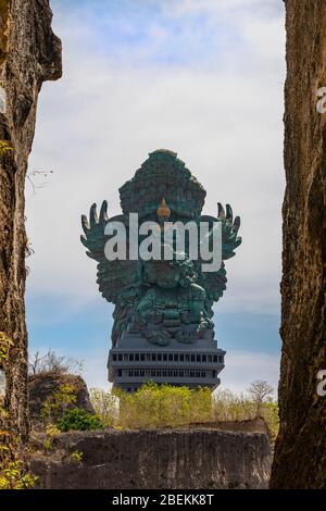 Vertical view of the GWK statue at Garuda Wisnu Kencana Cultural Park in Bali, Indonesia.
