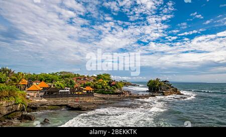 Horizontal panoramic of Tanah Lot temple in Bali, Indonesia. Stock Photo