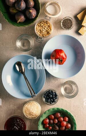 Concept: beginning of the day - healthy food. Composition of eco breakfast products. Stock Photo